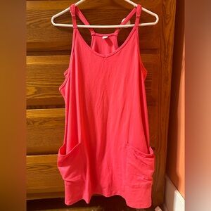 Bright pink romper with built in shorts.